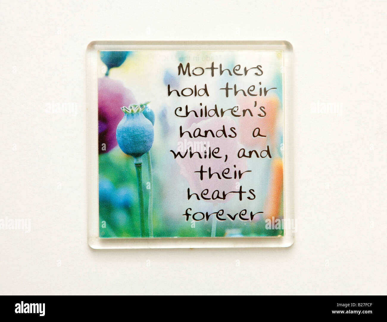 a small sign with a trusim about motherly love Stock Photo