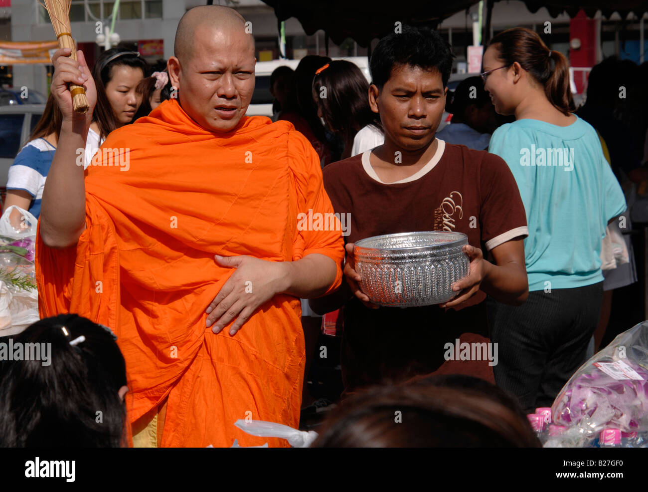 Monk holding alms bowl hi-res stock photography and images - Alamy