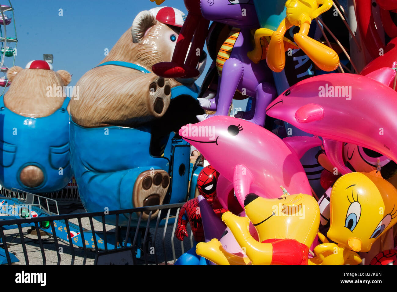 Toys are stacked up as prizes for the winners at a summer carnival in Newport Rhode Island Stock Photo