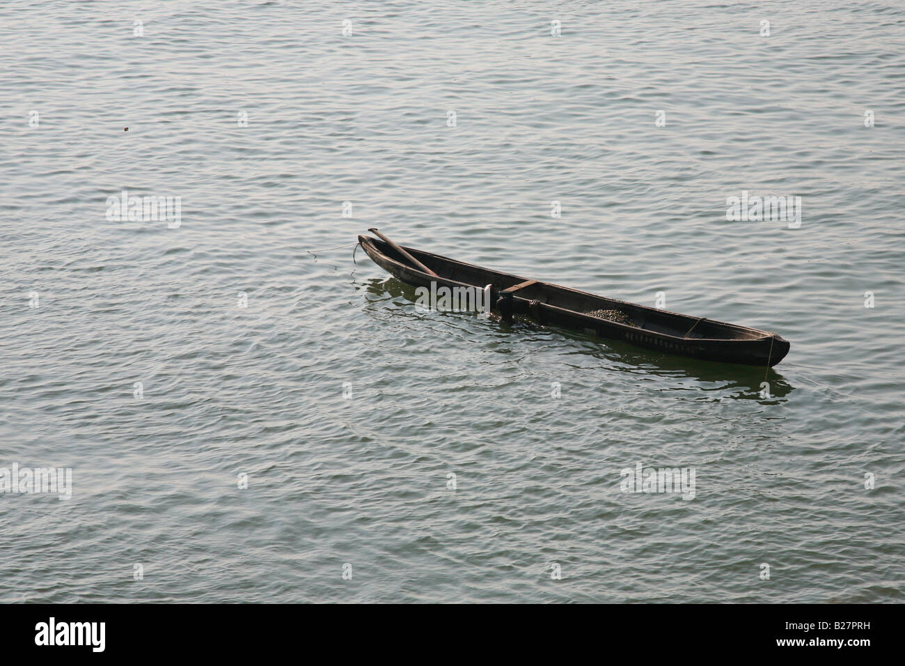 A canoe in backwater of kerala Stock Photo Alamy