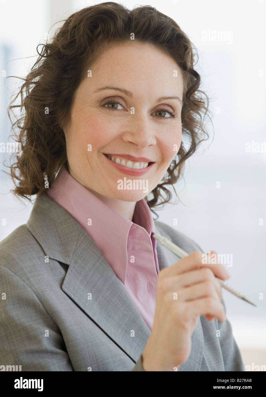 Holding pen mature woman hi-res stock photography and images - Alamy