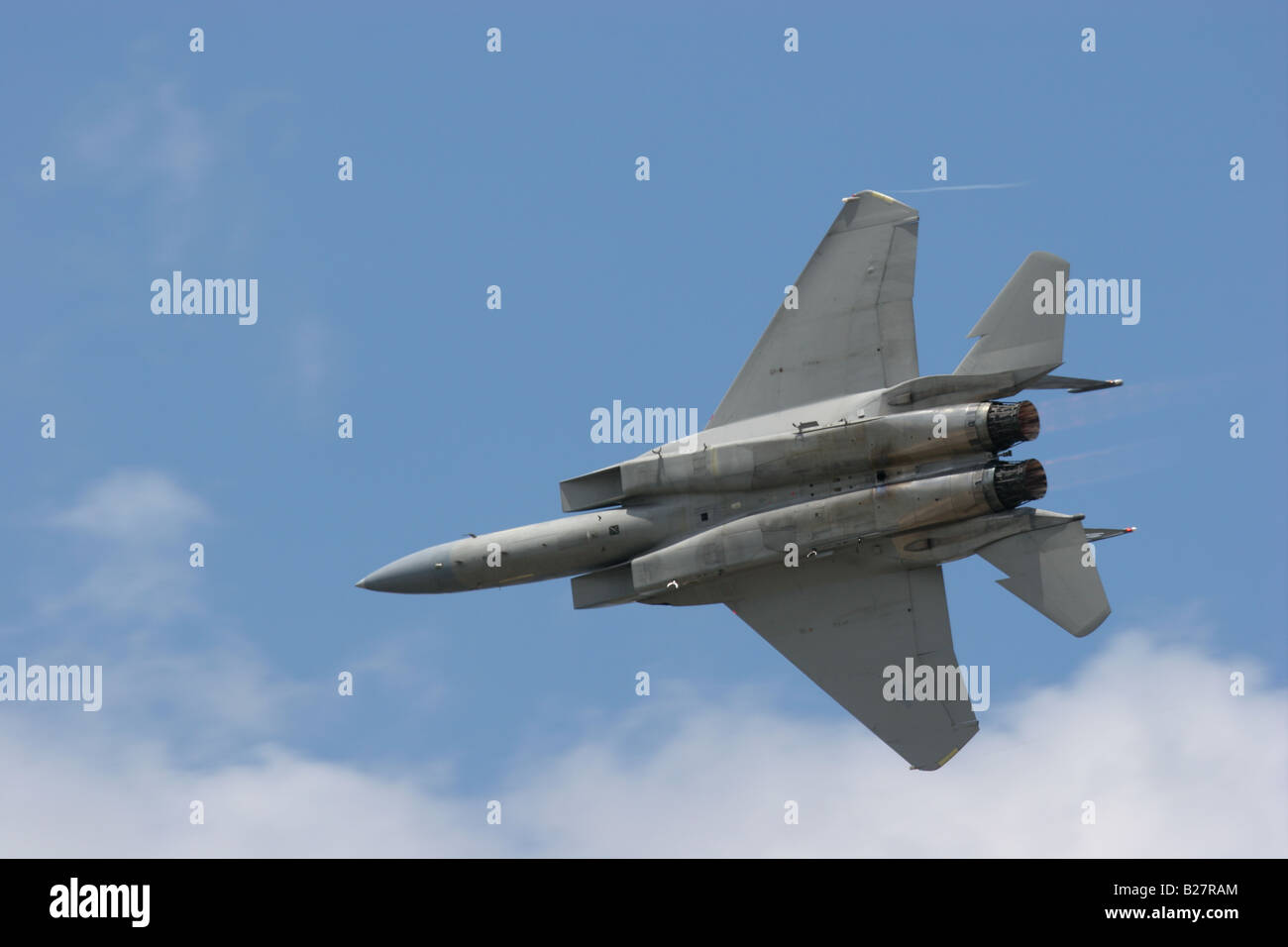 An F 15C of the First Fighter Wing turns in afterburner Stock Photo