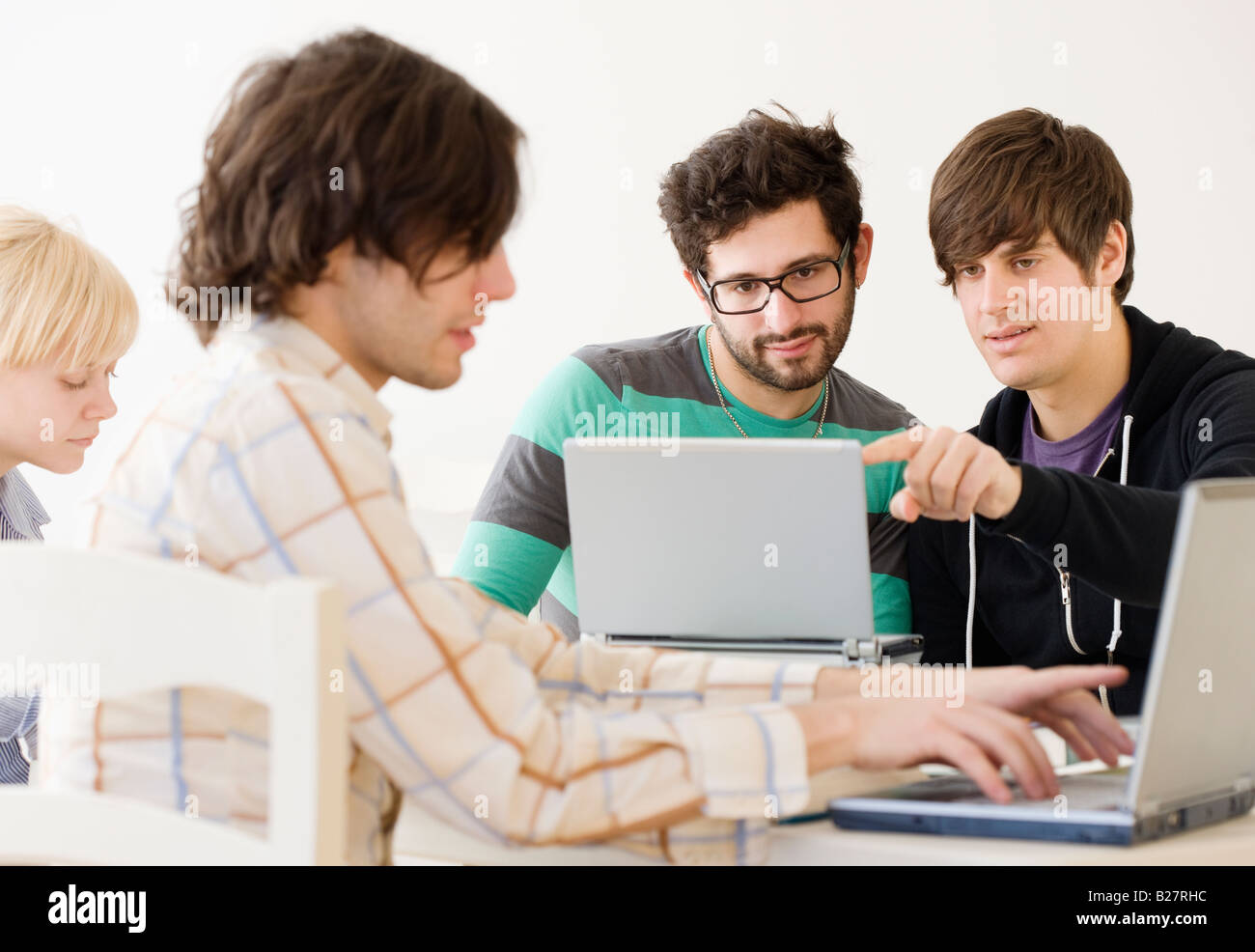College students with laptops in classroom Stock Photo Alamy