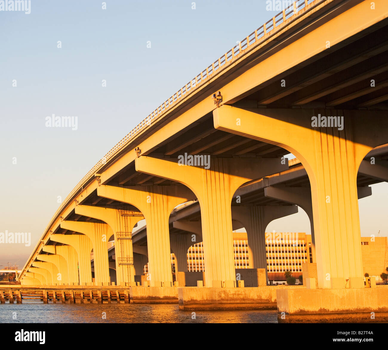 Low angle view of elevated highway over water Stock Photo