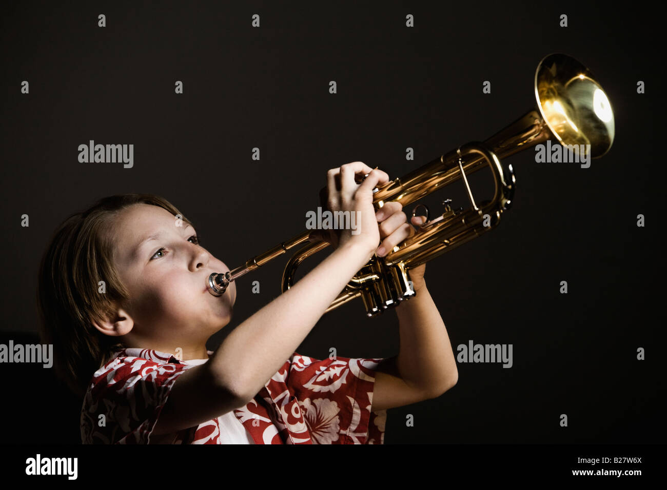 Talented boy playing the trumpet hi-res stock photography and images - Alamy