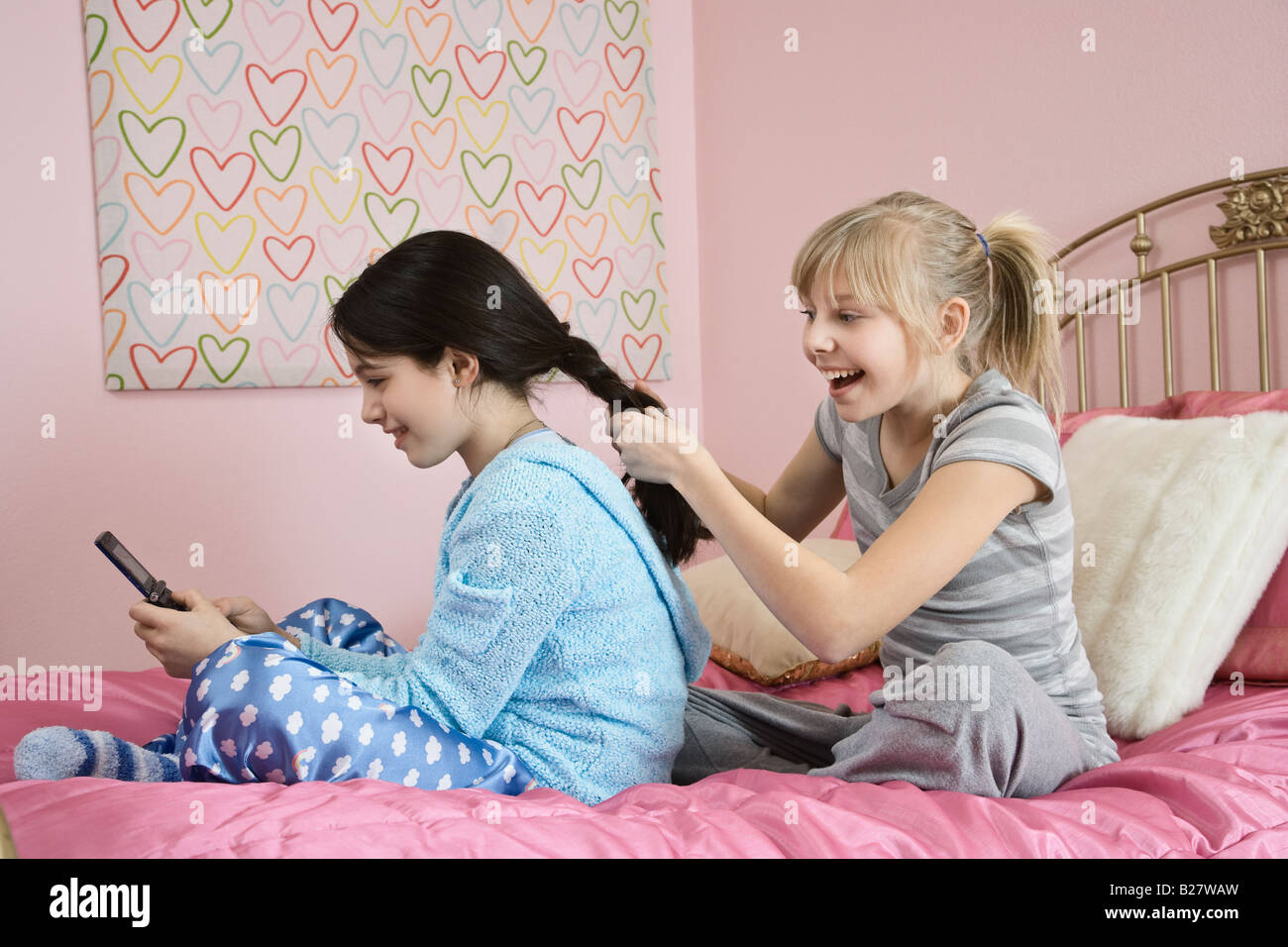 Girl Braiding Friend S Hair Stock Photo 18613249 Alamy