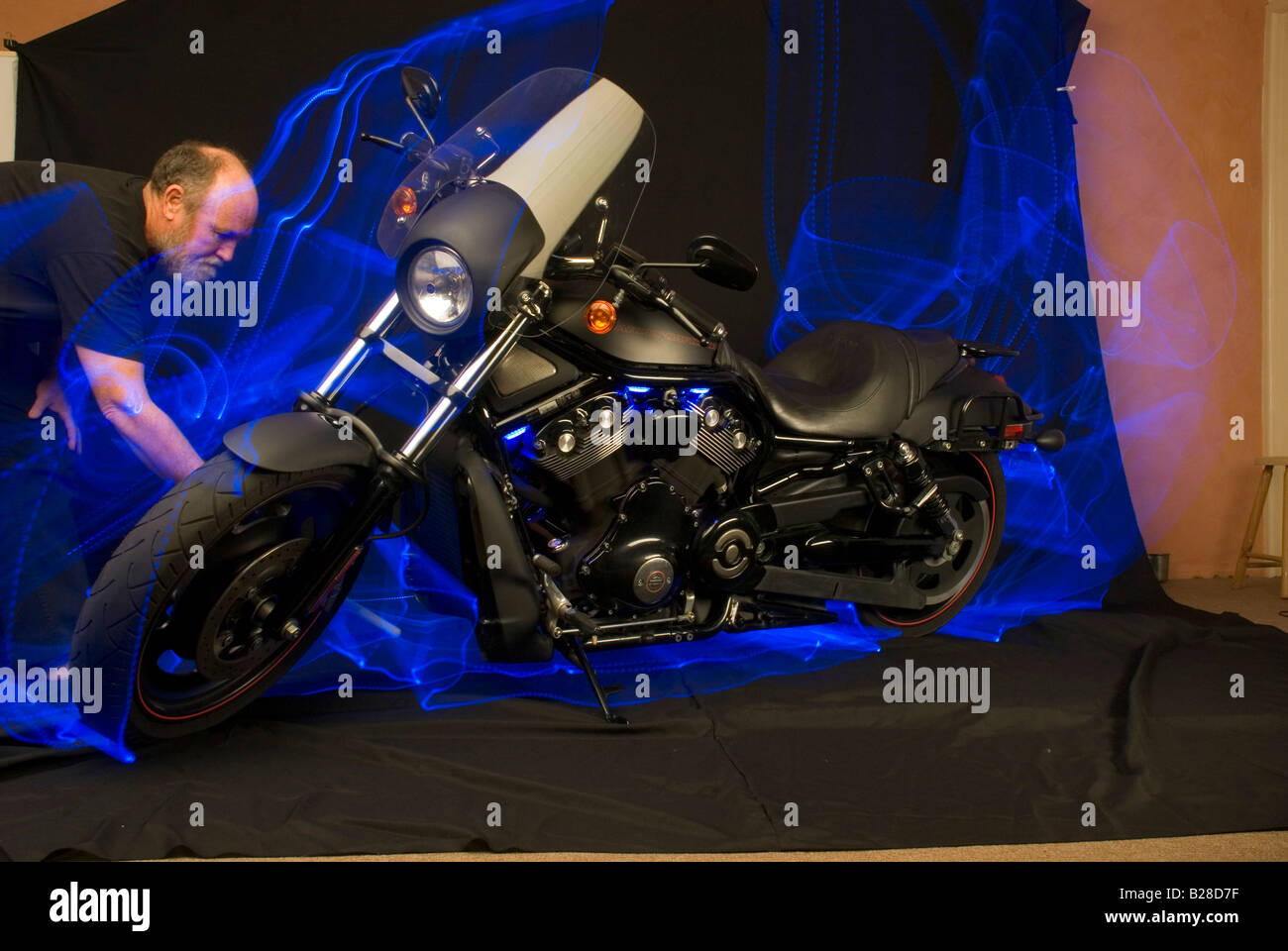 light painting a Harley Davidson V Rod in a studio Stock Photo