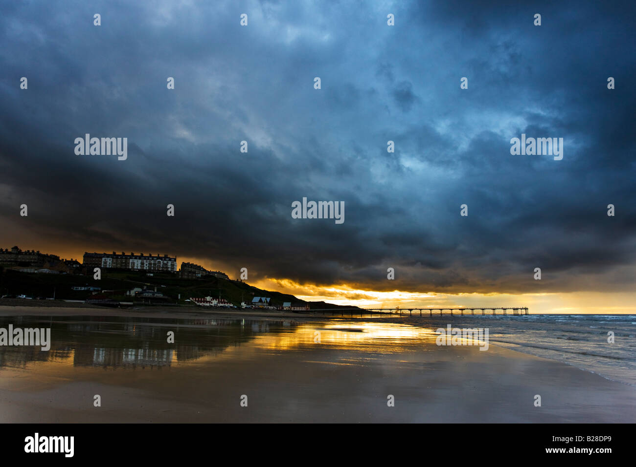 Stormy sky at low tide Saltburn Cleveland Stock Photo