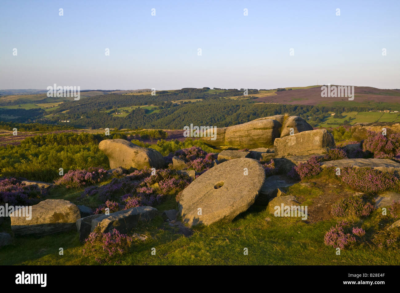 Rocks and a millstone near to Mother Cap in the Peak District Stock Photo