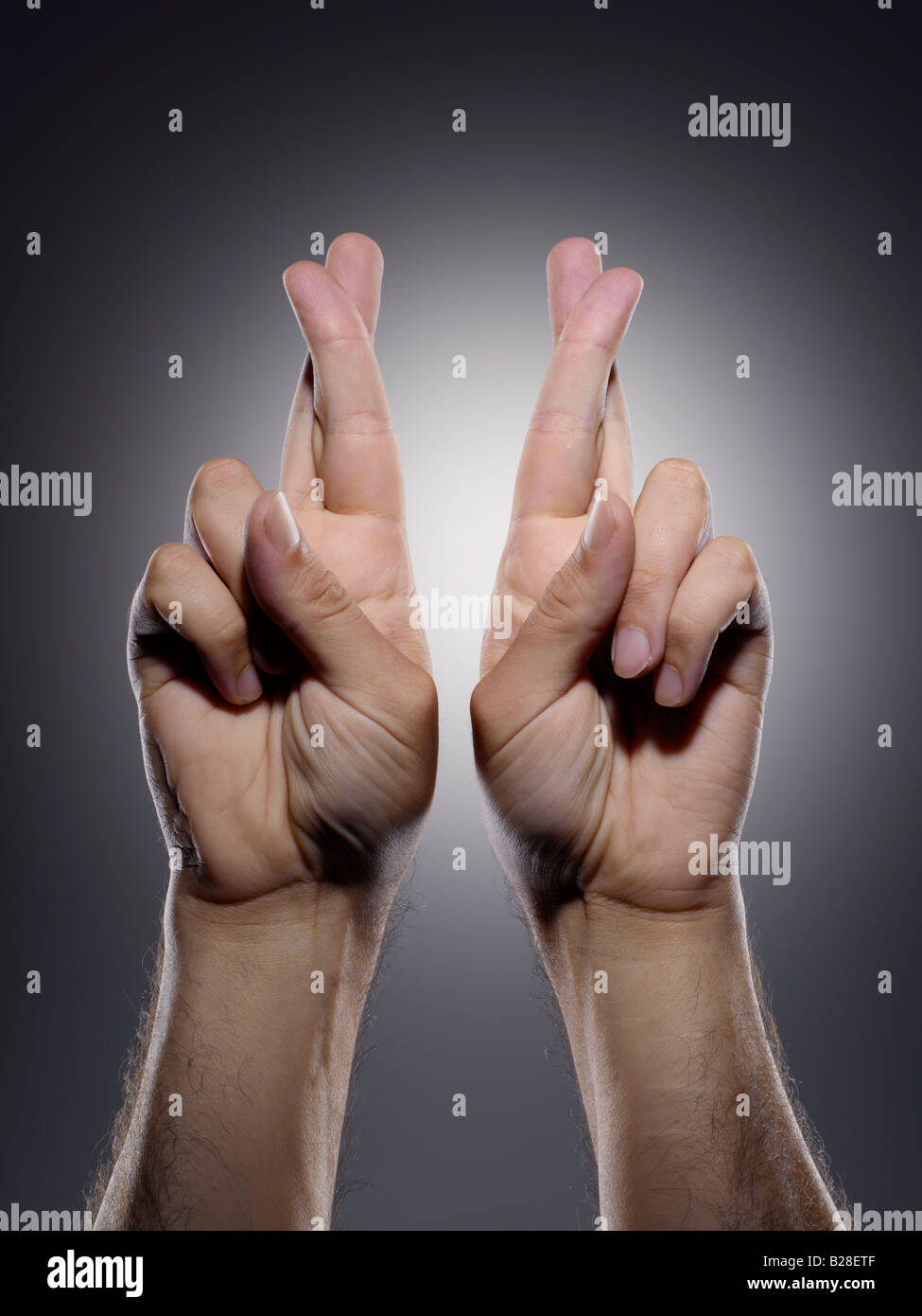 Keep both fingers crossed Stock Photo Alamy