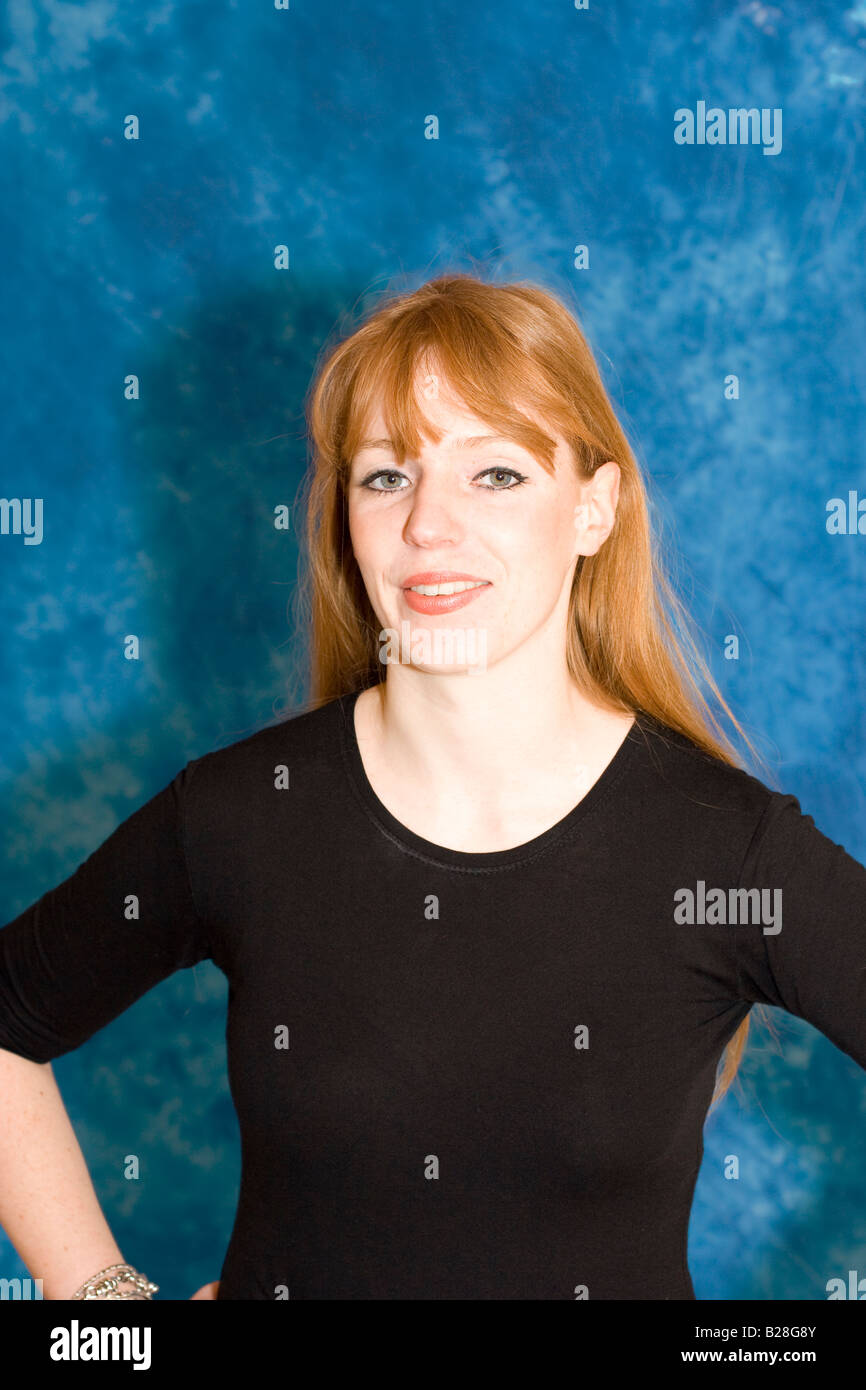 portrait of attractive young woman with long red hair Stock Photo - Alamy