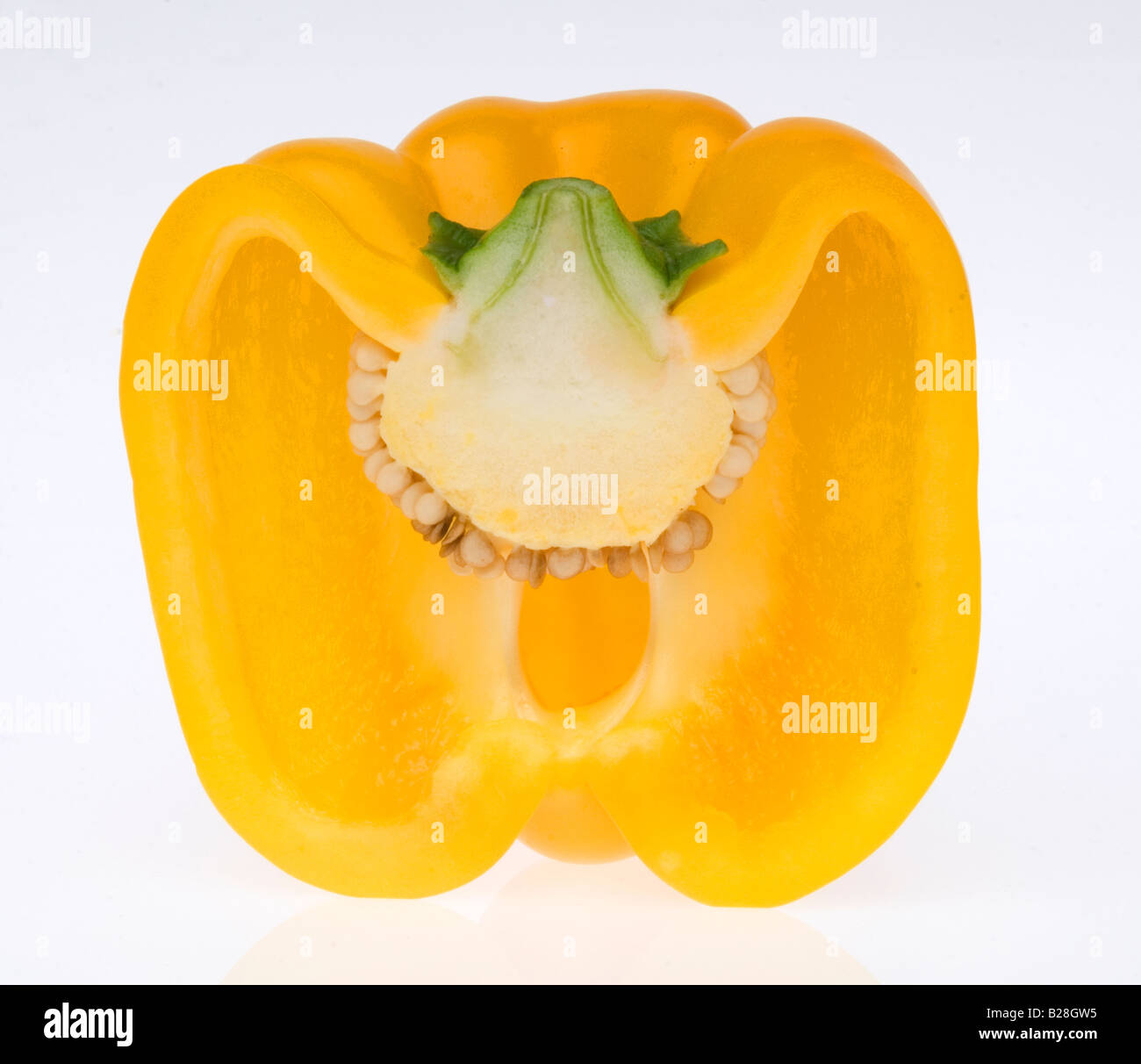 Halved yellow  bell pepper capsicum annum Stock Photo