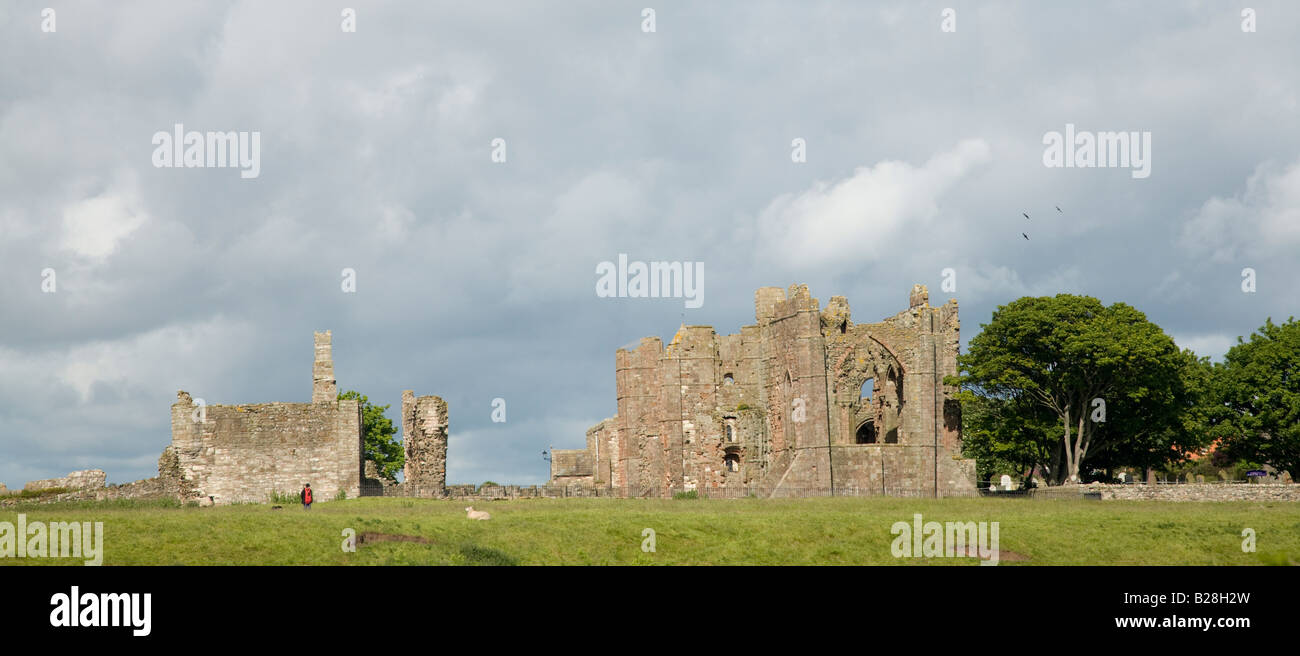 Lindisfarne Abbey viewed from the shore Stock Photo
