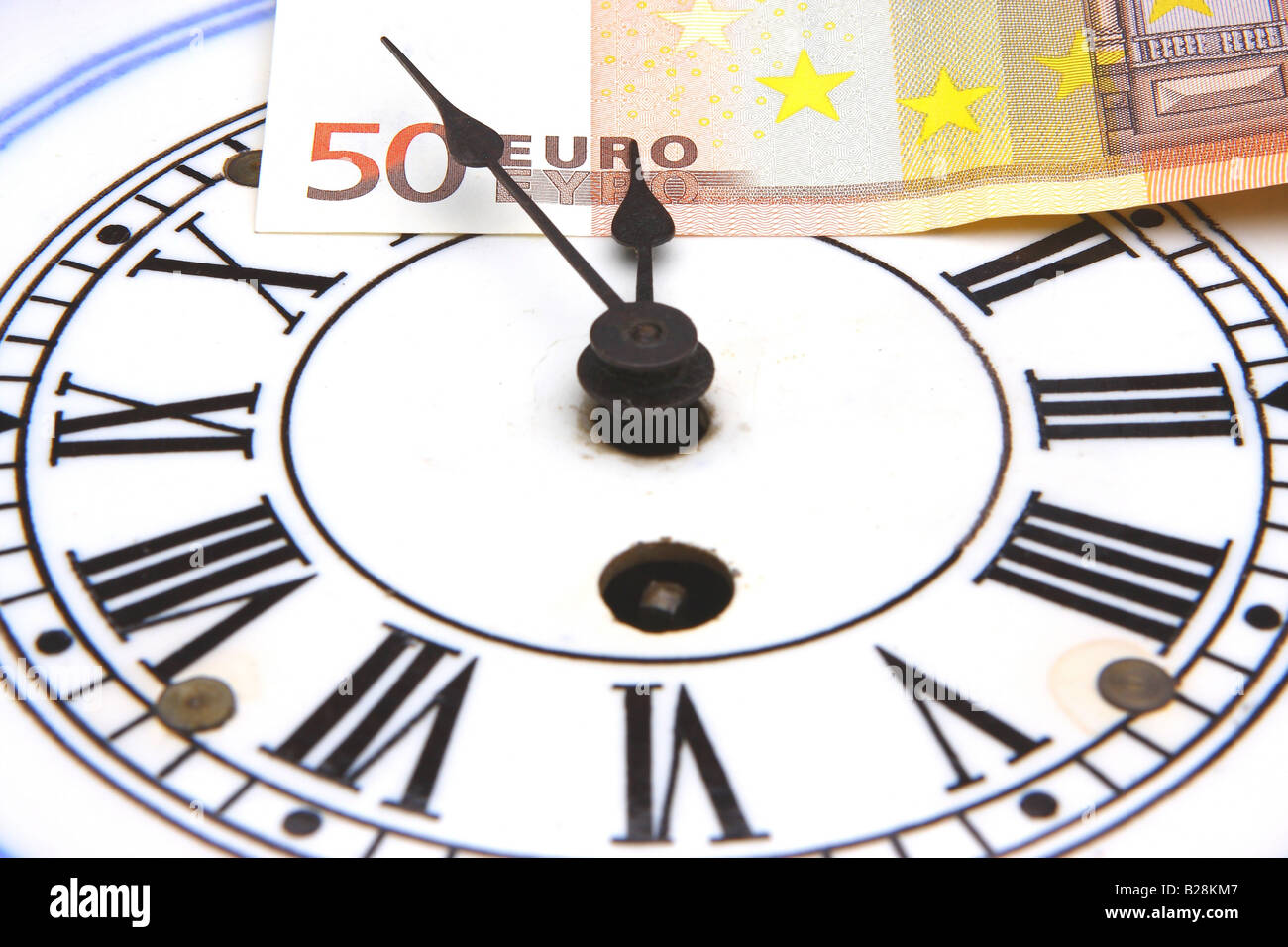 Paper Money and Clock Stock Photo