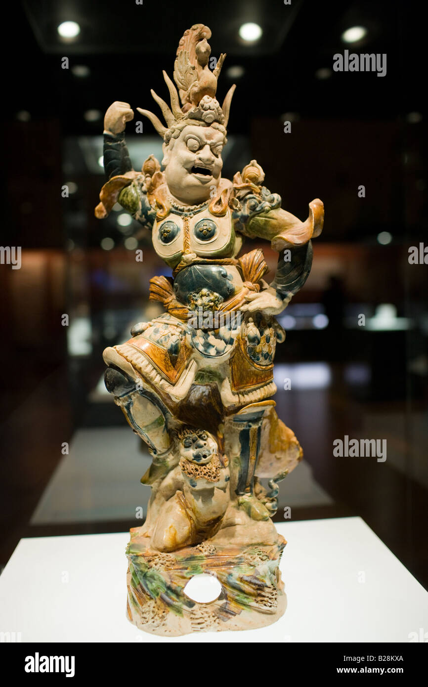 Figurine on display in glass case in the Shaanxi History Museum Xian China Stock Photo