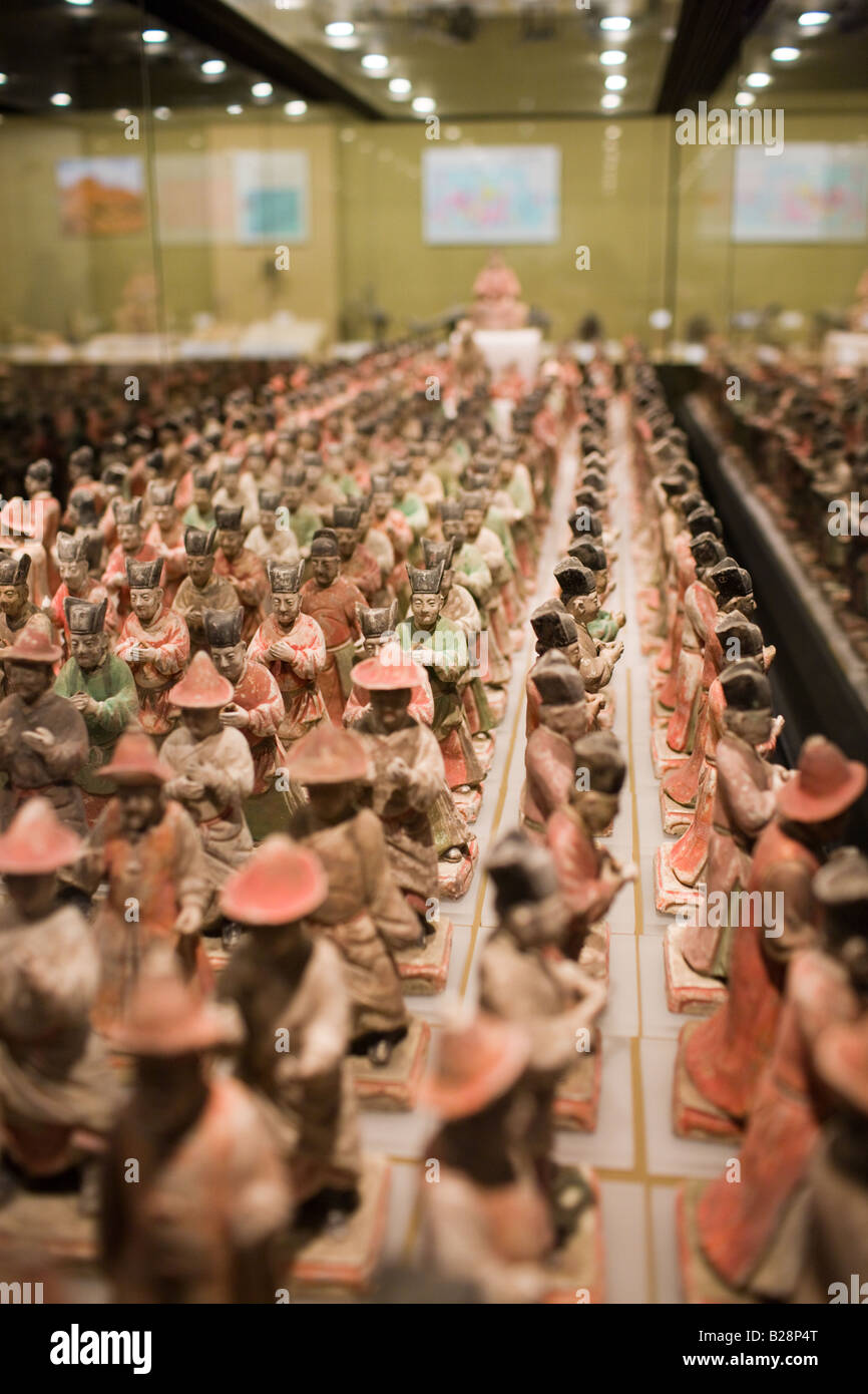 Figurines on display in glass case in the Shaanxi History Museum Xian China Stock Photo