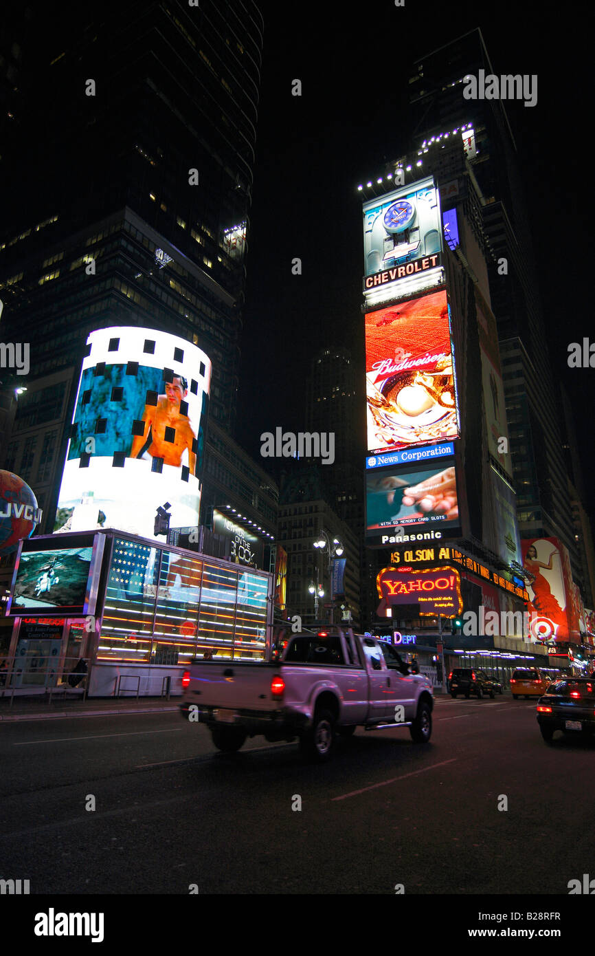 Times Square lights at night - New York City, USA Stock Photo
