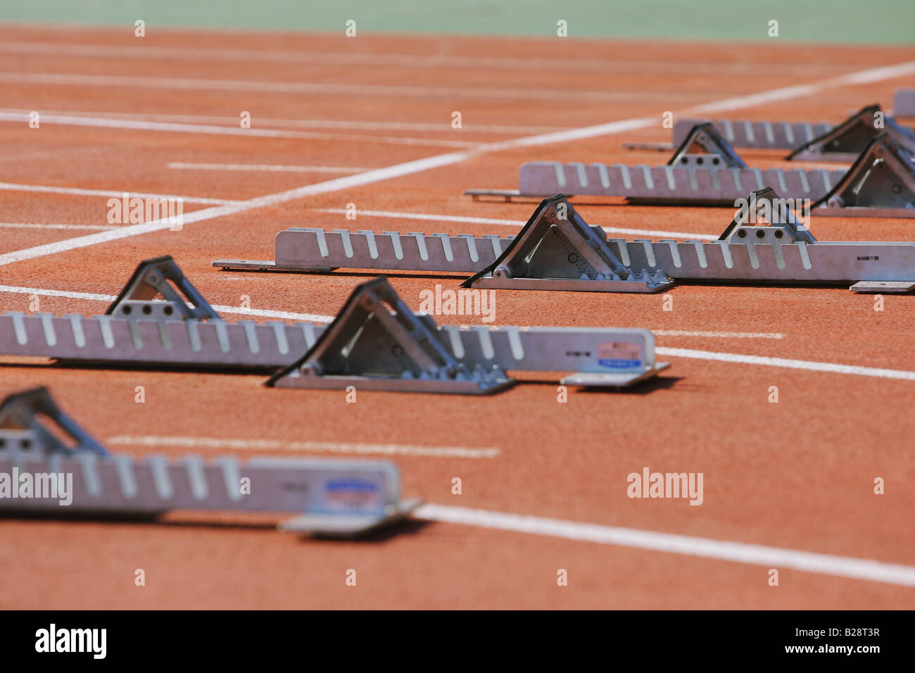 Track and field starting blocks at starting line Stock Photo Alamy