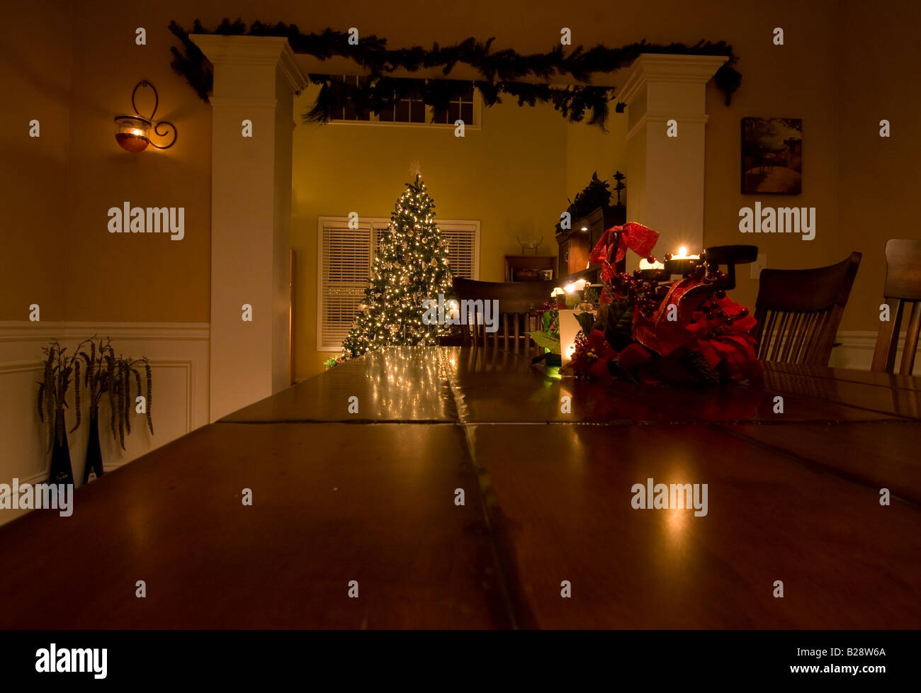 Christmas table with candle Stock Photo - Alamy