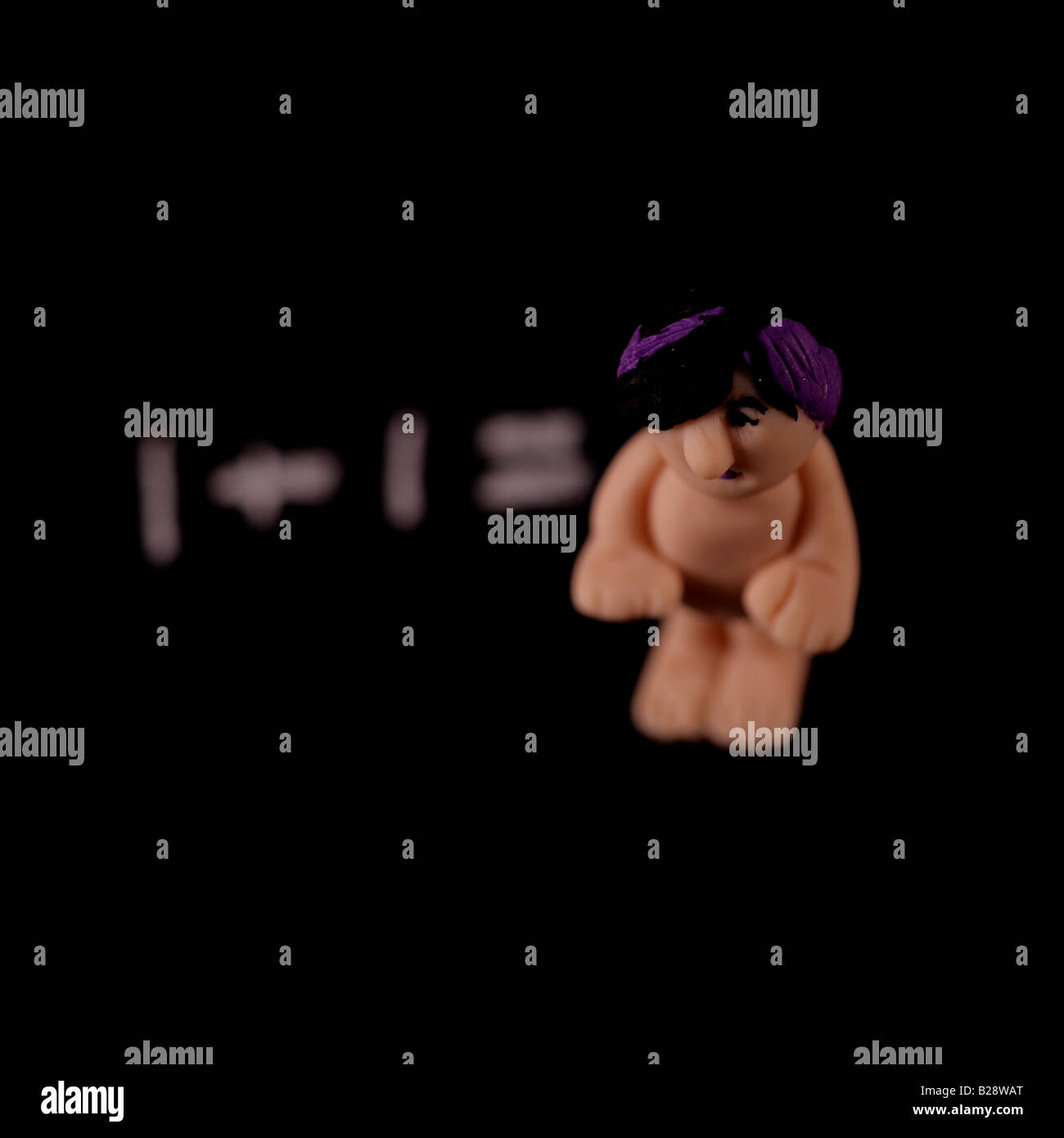 maths teacher with blackboard Stock Photo