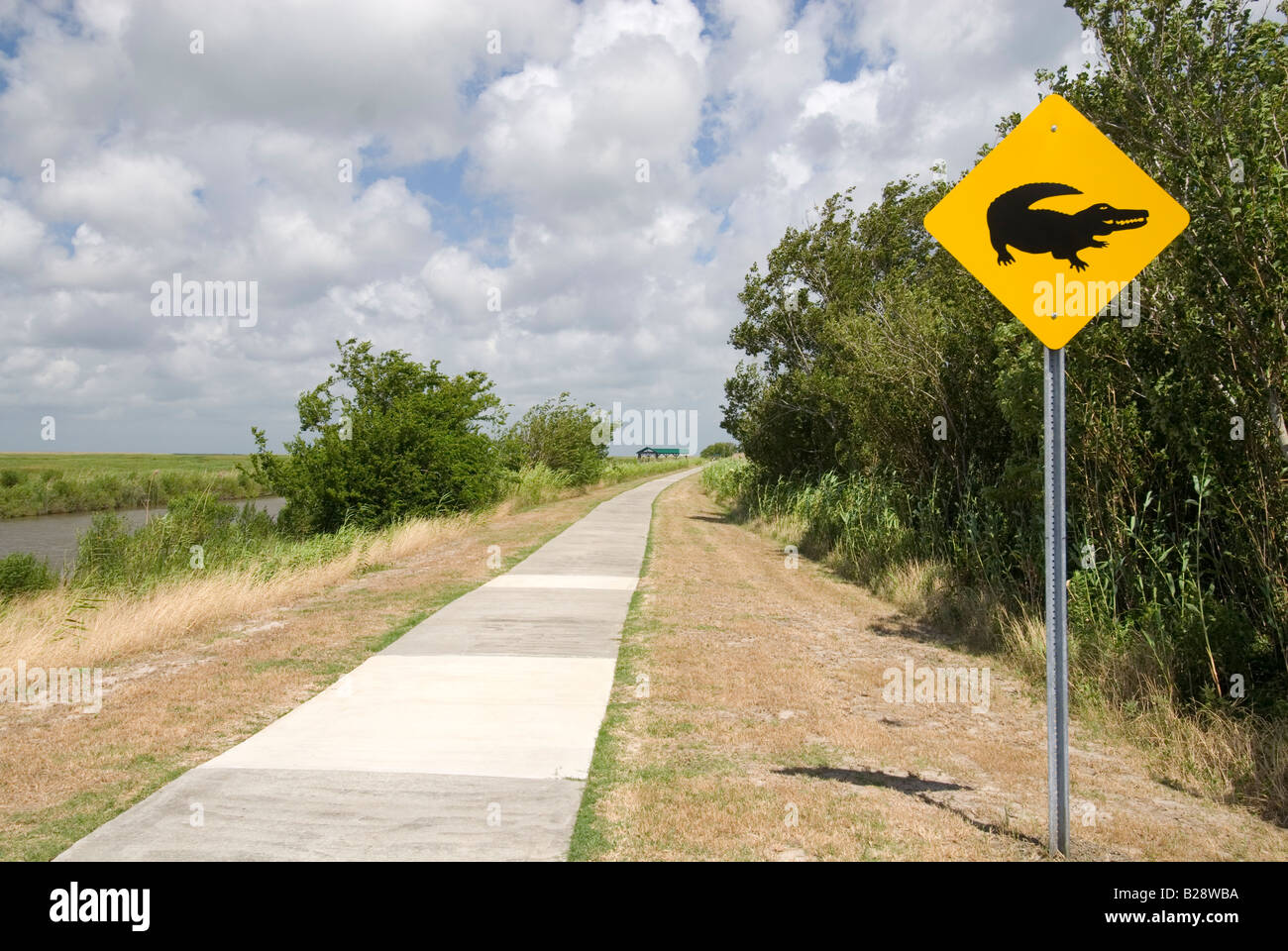 Alligator crossing sign on the Wetland Walkway at Sabine National