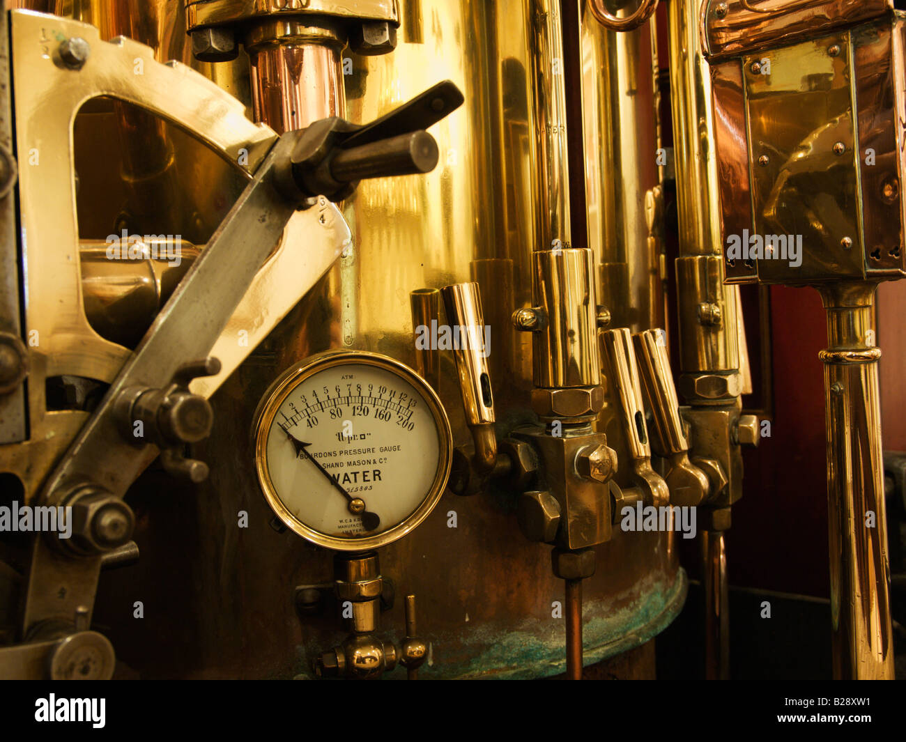 Brass Water Pressure Gauge on Vintage Fire Engine Stock Photo