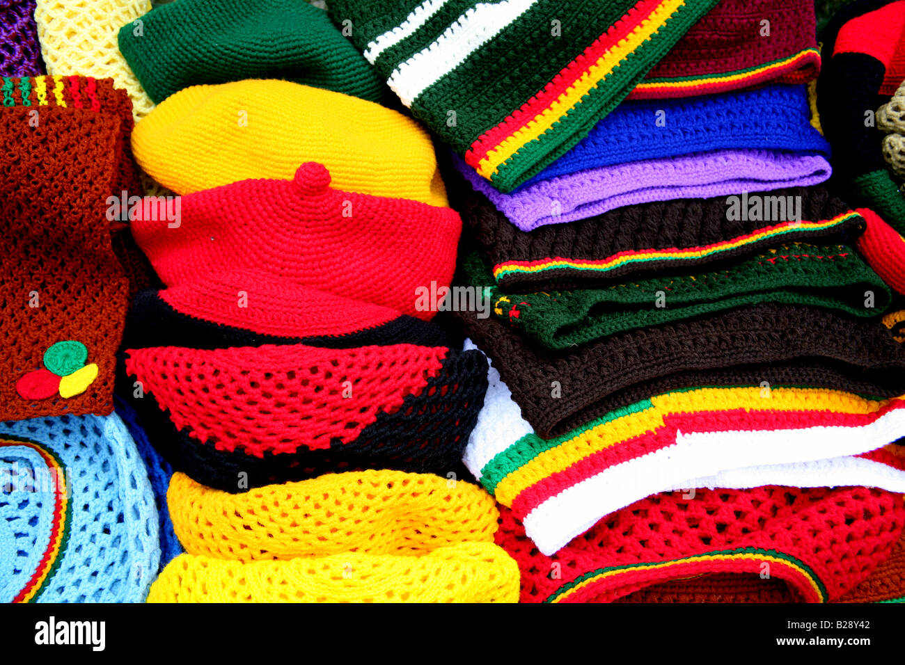 Rastafarian and Jamaican coloured clothing on sale at London festival Stock Photo