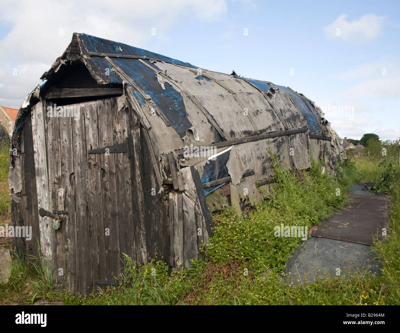 Upturned boat holy island beach hi-res stock photography and images - Alamy