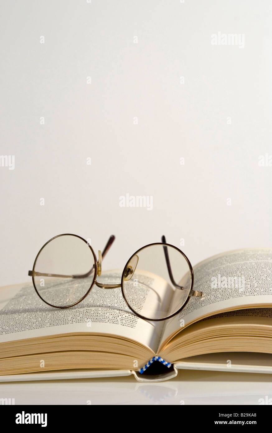 Book spectacles glasses eyeglasses hi-res stock photography and images ...