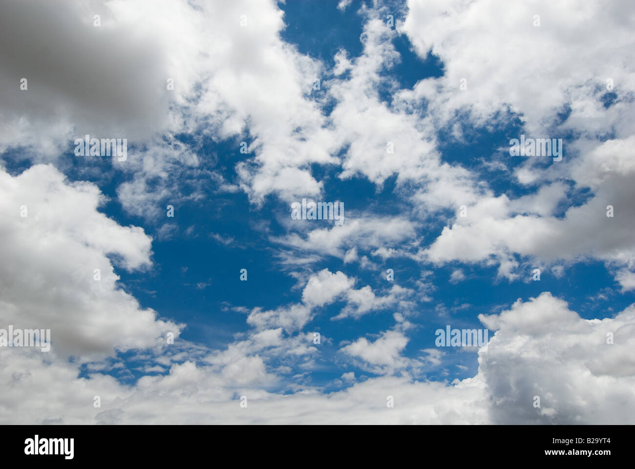 white clouds over deep blue sky background Stock Photo - Alamy