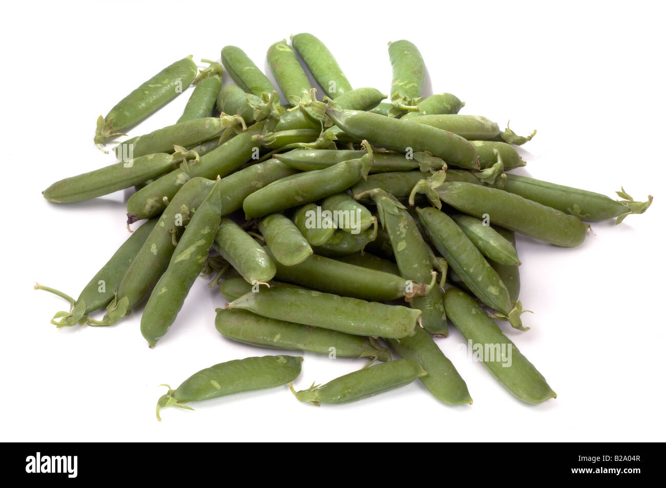 Unshelled garden peas Stock Photo