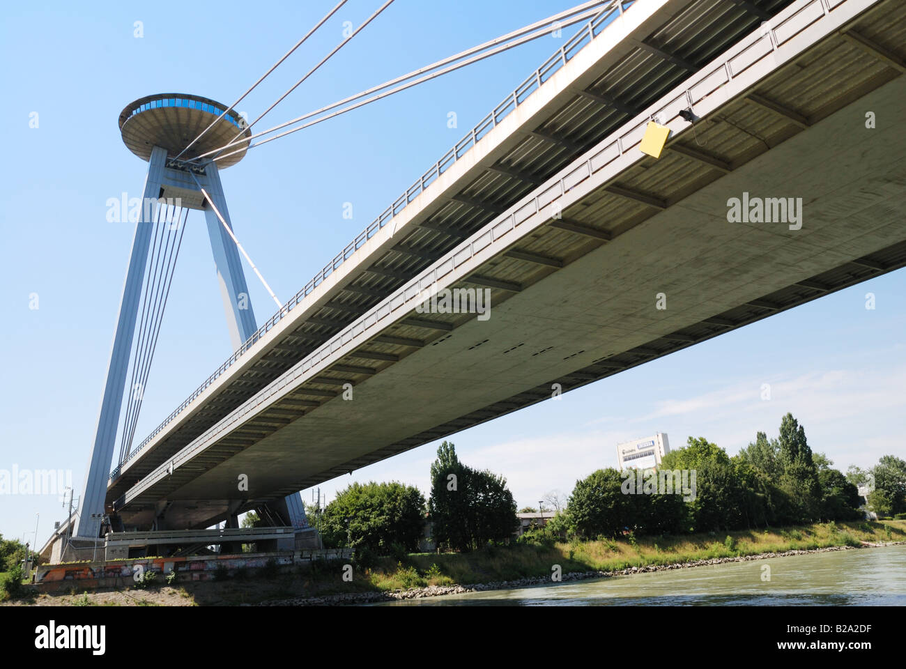 The SNP bridge over Danube in Bratislava (view from surface level). Stock Photo