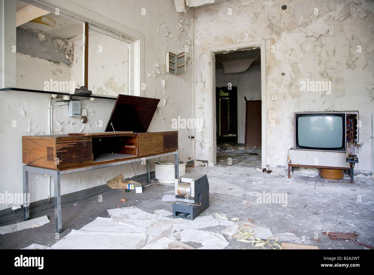 A Record Player And Tv Are Left In Place In An Abandoned