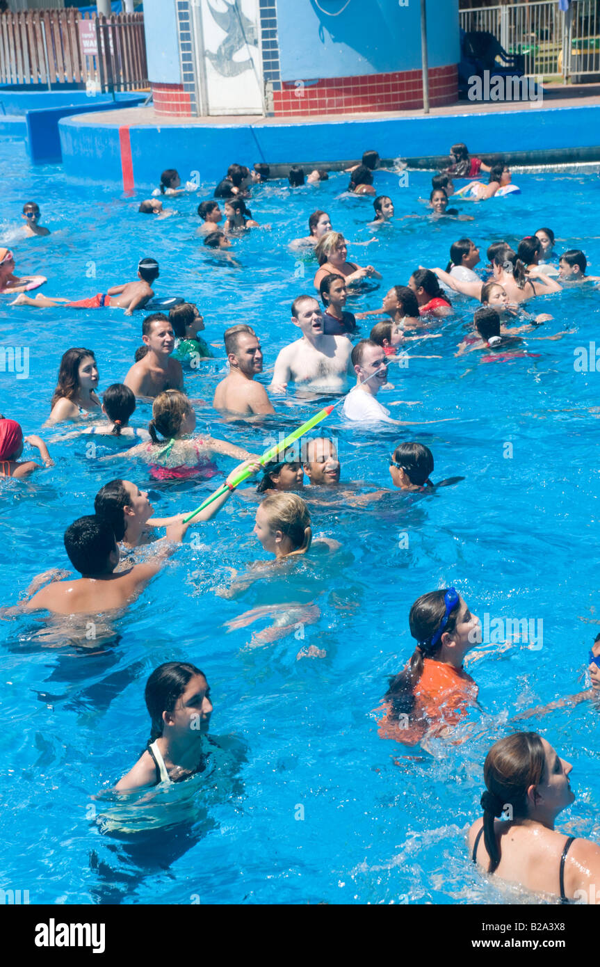 Israel Sfaim water Park summer fun in a crowded swimming pool Stock