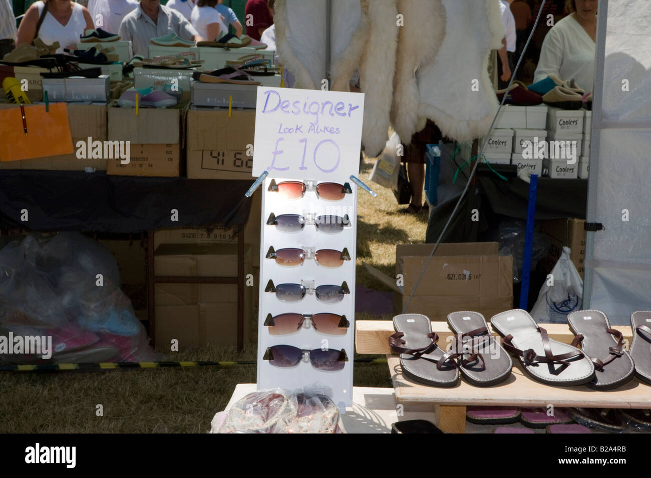 Fake sunglasses for sale at a country fair Devon England Stock Photo
