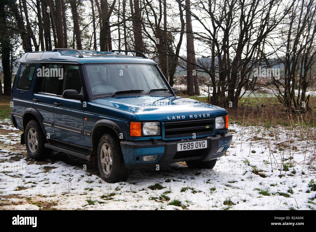 Land Rover in the snow Stock Photo