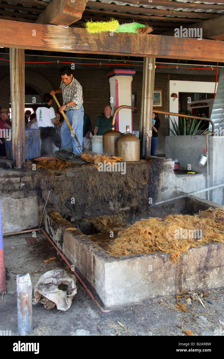 Mezcal Factory Nr Oaxaca, Mexico. Distilling the Raw Liquor to Make Mezcal. Stock Photo