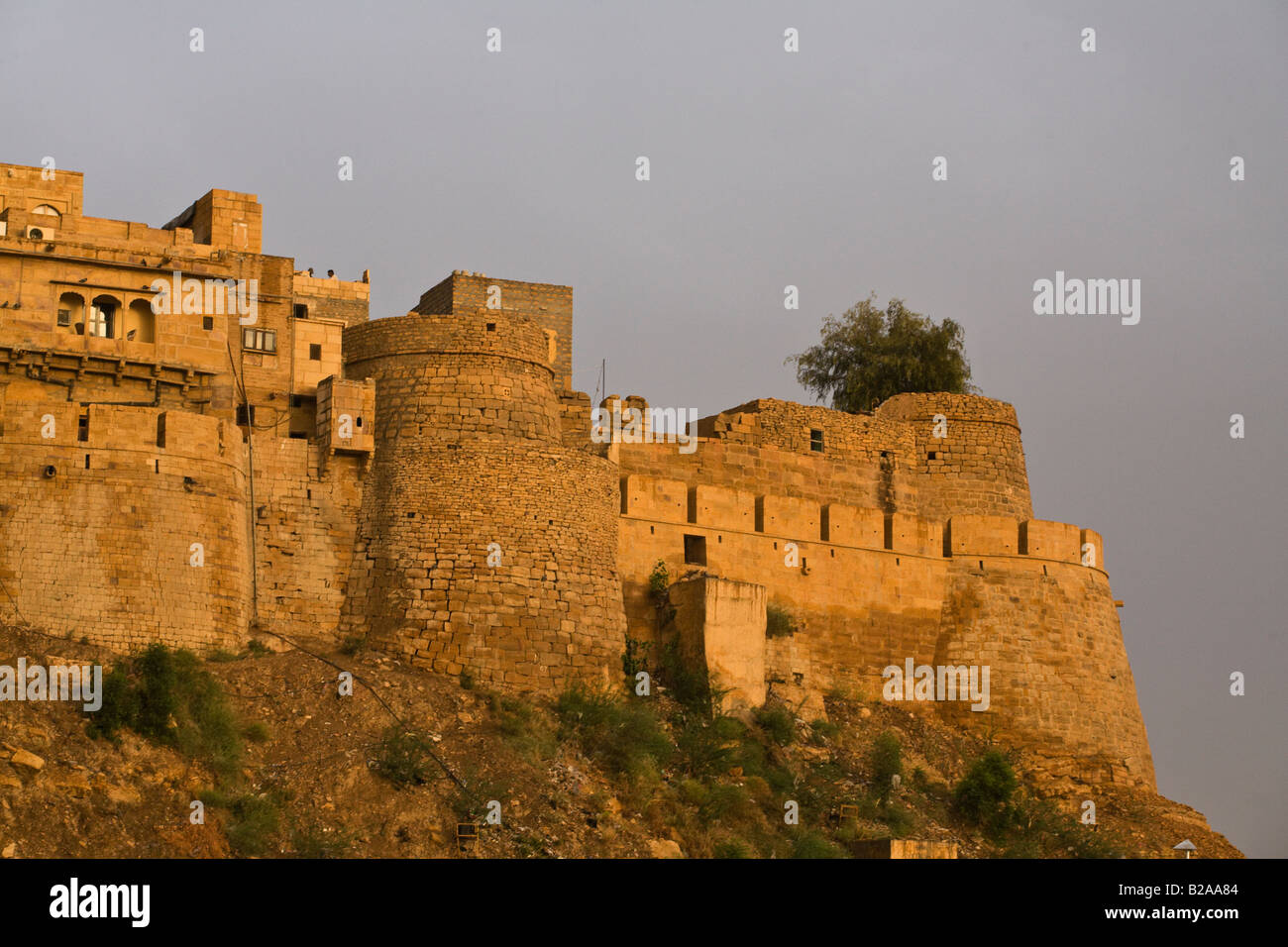 Two of the ninety nine BASTIONS of the outer wall of JAISALMER FORT built in 1156 on Trikuta Hill out of sandstone RAJASTHAN IND Stock Photo