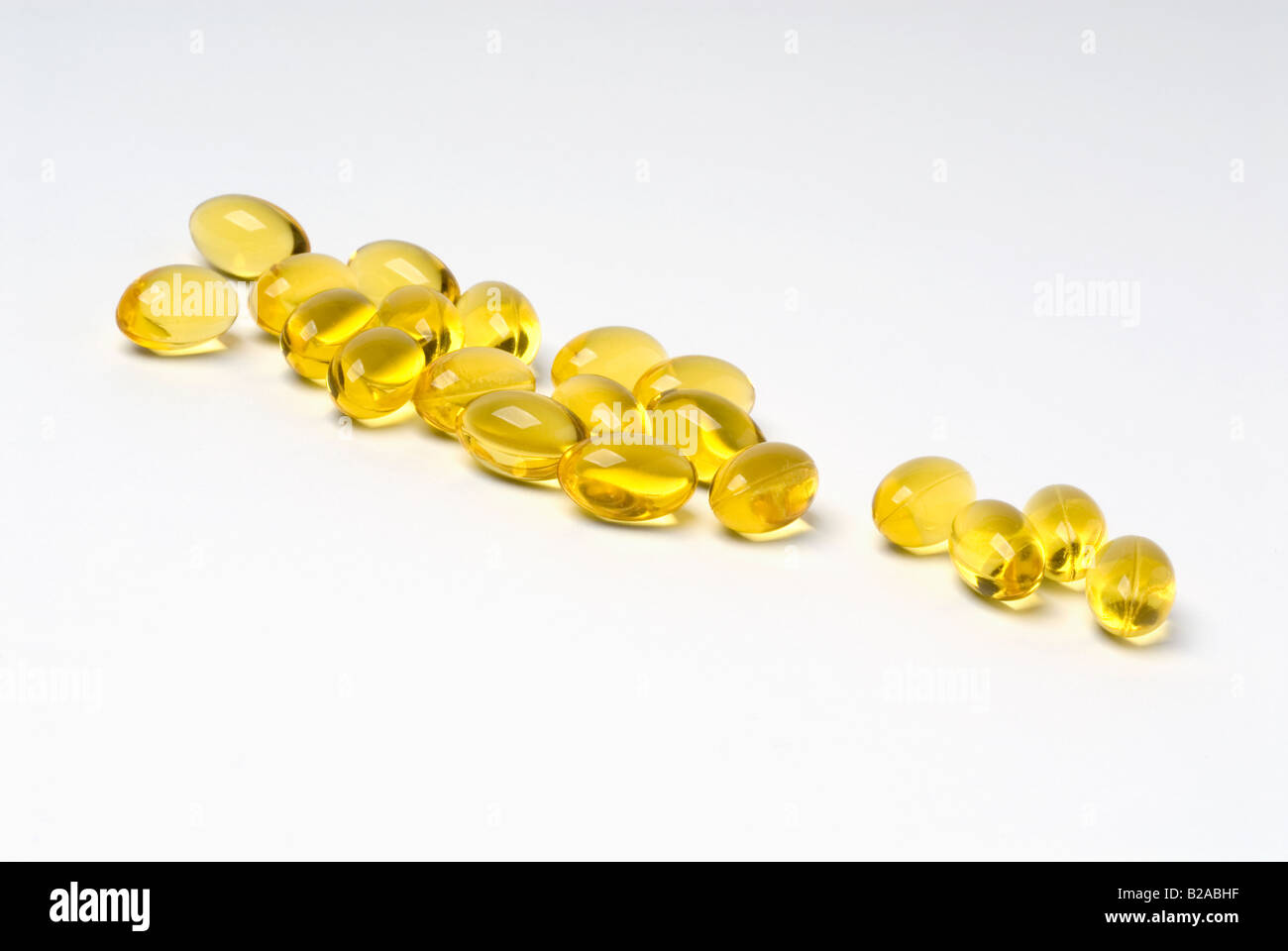 Omega-3 and Omega-6 liquid vitamin supplement capsules for nutrition and brain and eye function Stock Photo