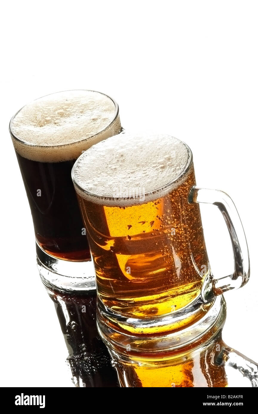 two beers in glasses on the white background Stock Photo