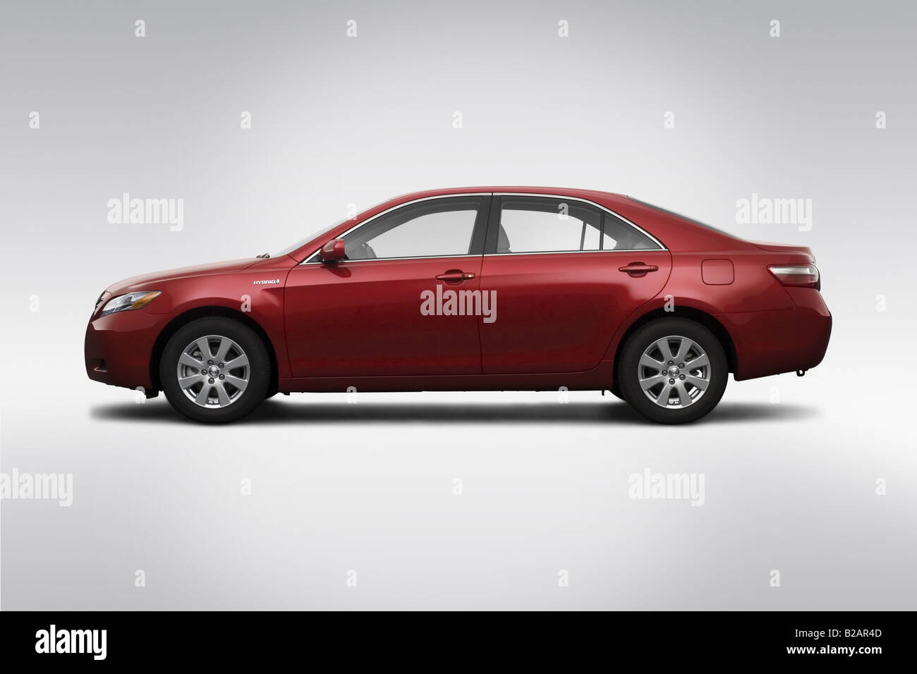 2009 Toyota Camry Hybrid In Red Drivers Side Profile Stock Photo Alamy