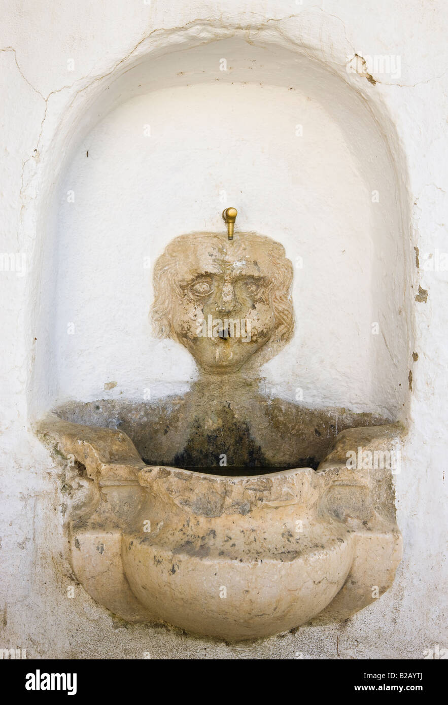 Macharaviaya Inland Costa del Sol Malaga Province Spain Grotesque figure on 18th century fountain Stock Photo