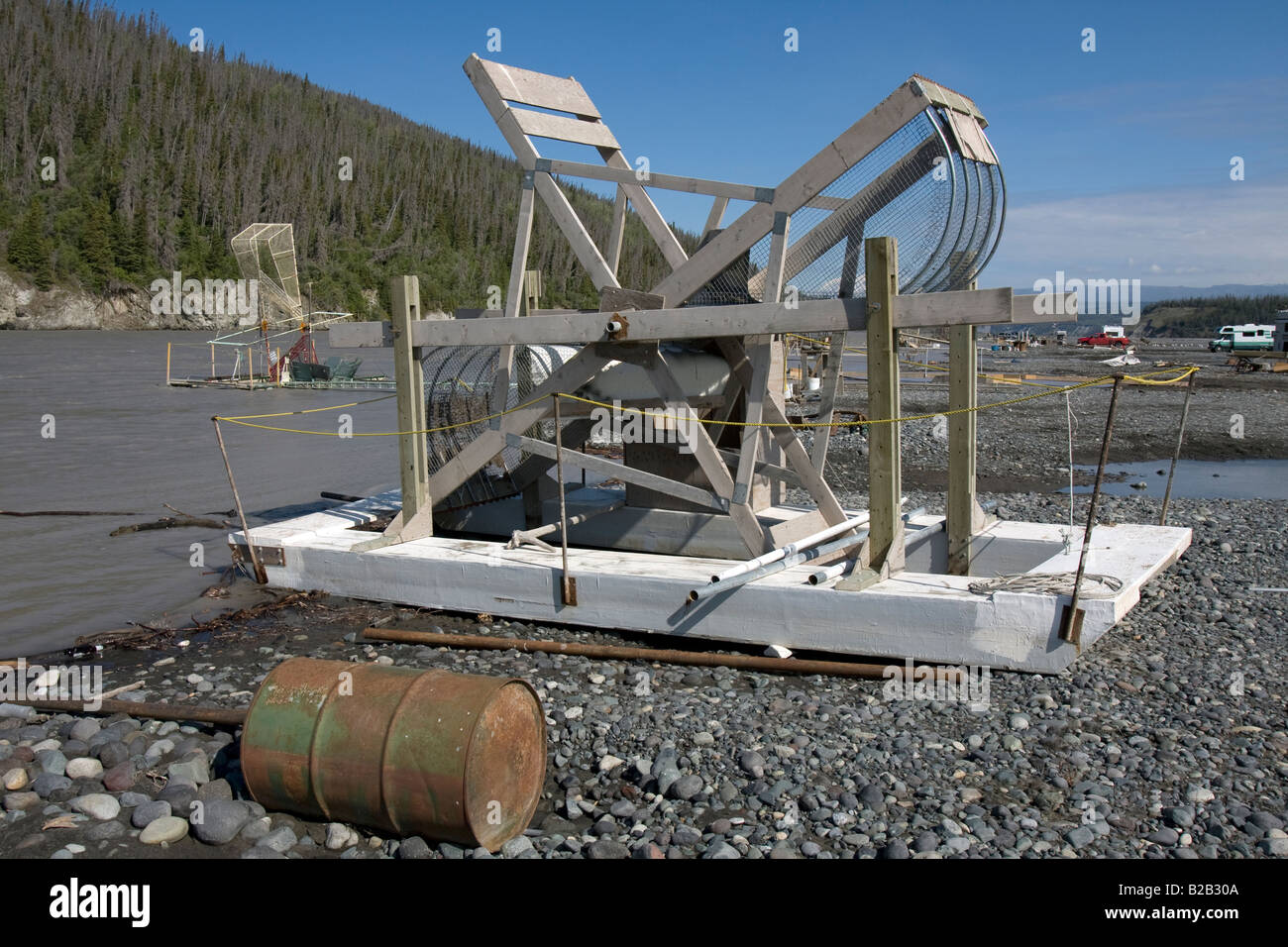 Fishing wheel ashore, for automated catching of salmon in Copper River near  Chitina, Alaska Stock Photo - Alamy