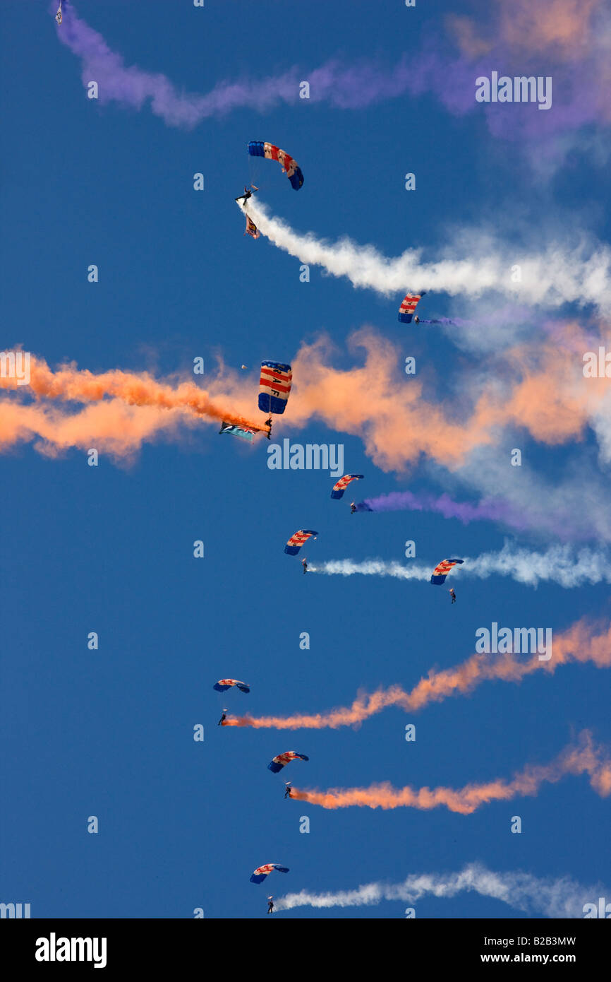 Royal Air Force parachute display with coloured smoke trails Norfolk United Kingdom Stock Photo