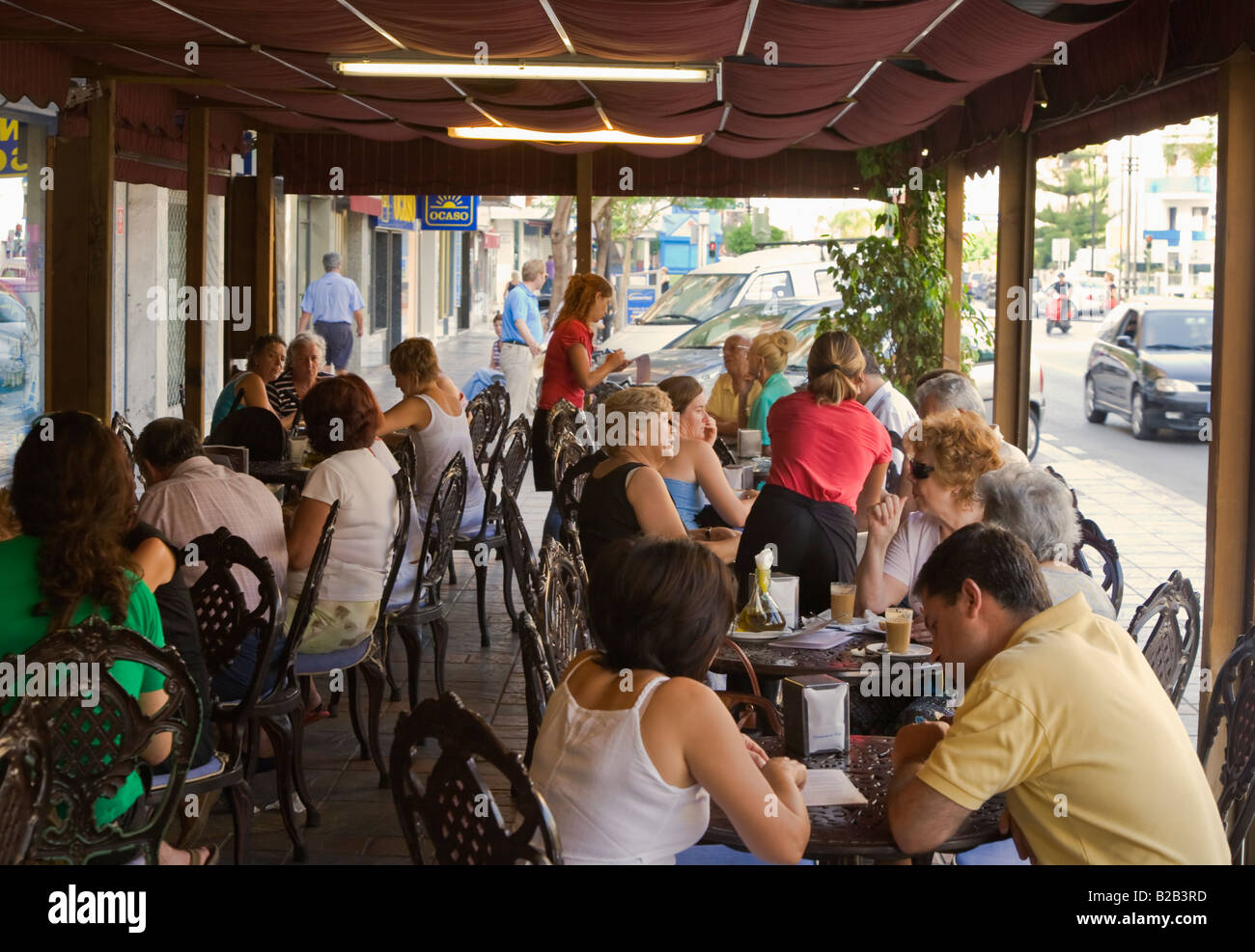 Outdoor seating area at La Tahona de Carmen cafe and bakery Fuengirola Malaga Province Costa del Sol Spain Stock Photo