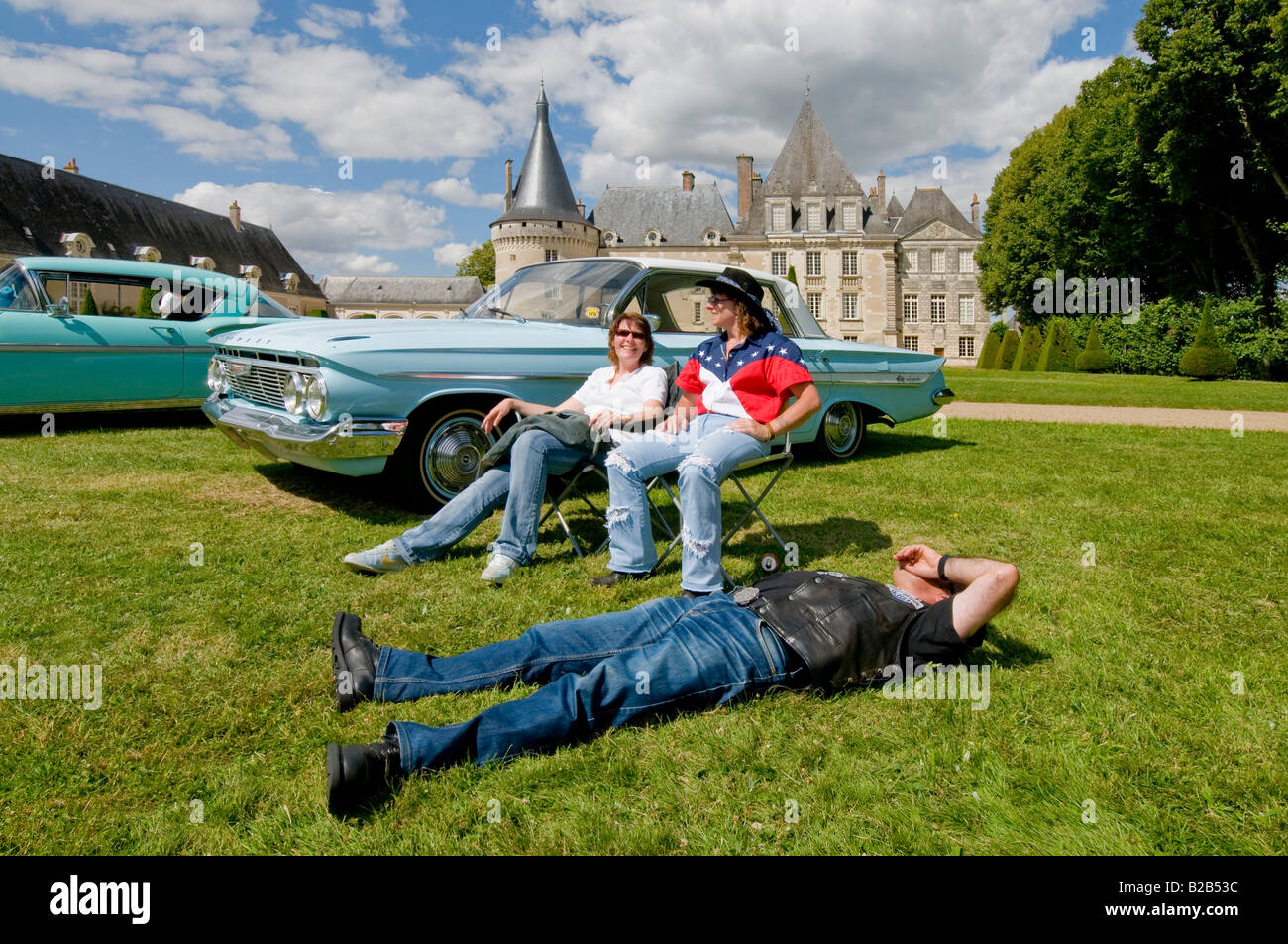 Chevrolet Impala and owners / enthusiasts at American car show in the