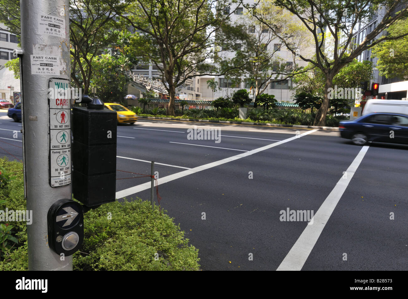 Pedestrian crossing in the Singapore Central Business District Stock