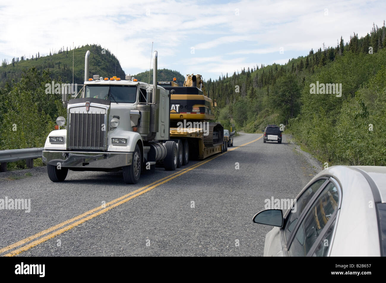 Heavy road transport of a big dragline in Alaska. Stock Photo