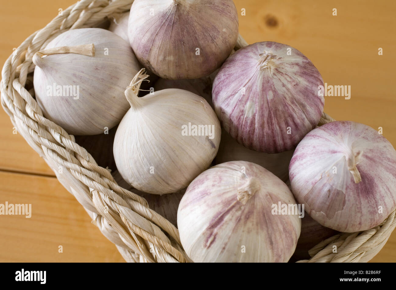 Single clove garlic from China in a little basket Stock Photo Alamy