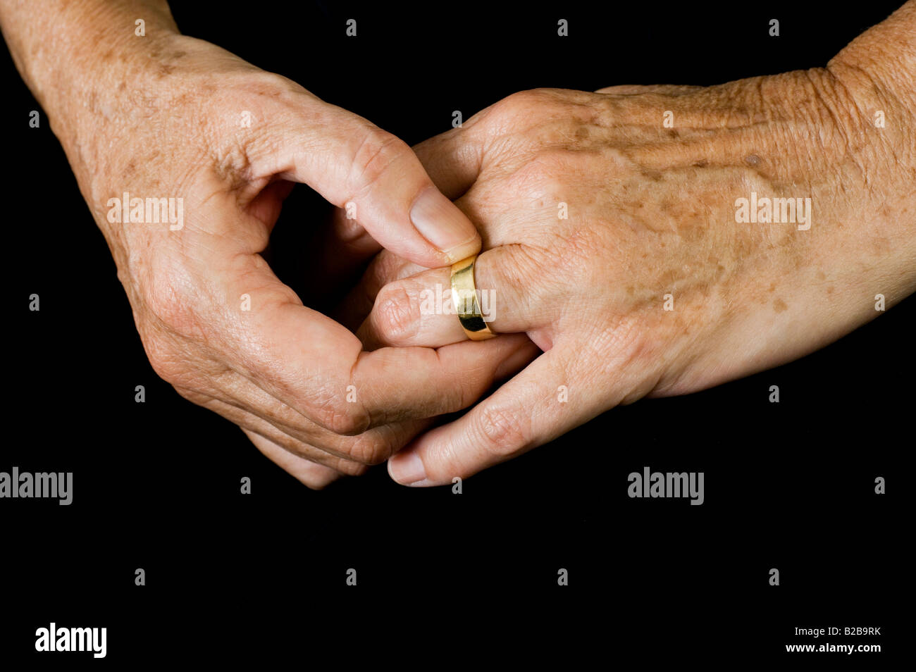 A man's hand with a wedding ring holds a woman's hand. 21683536 Stock Photo  at Vecteezy